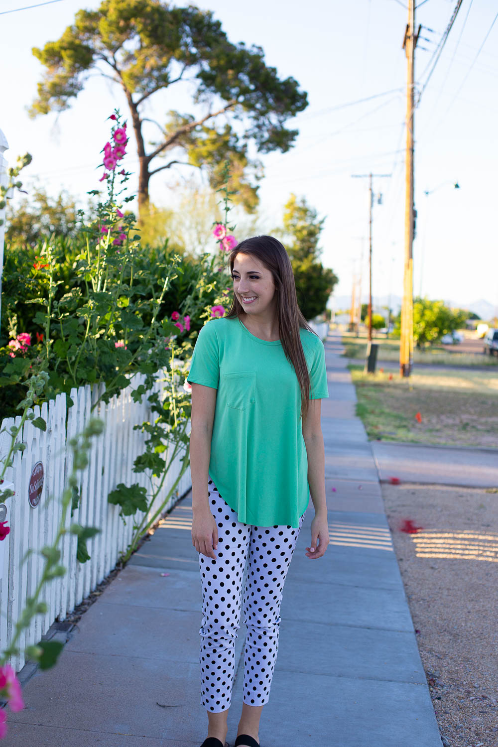 Mint green soft T-shirt with front pocket, side slits and high-low hemline