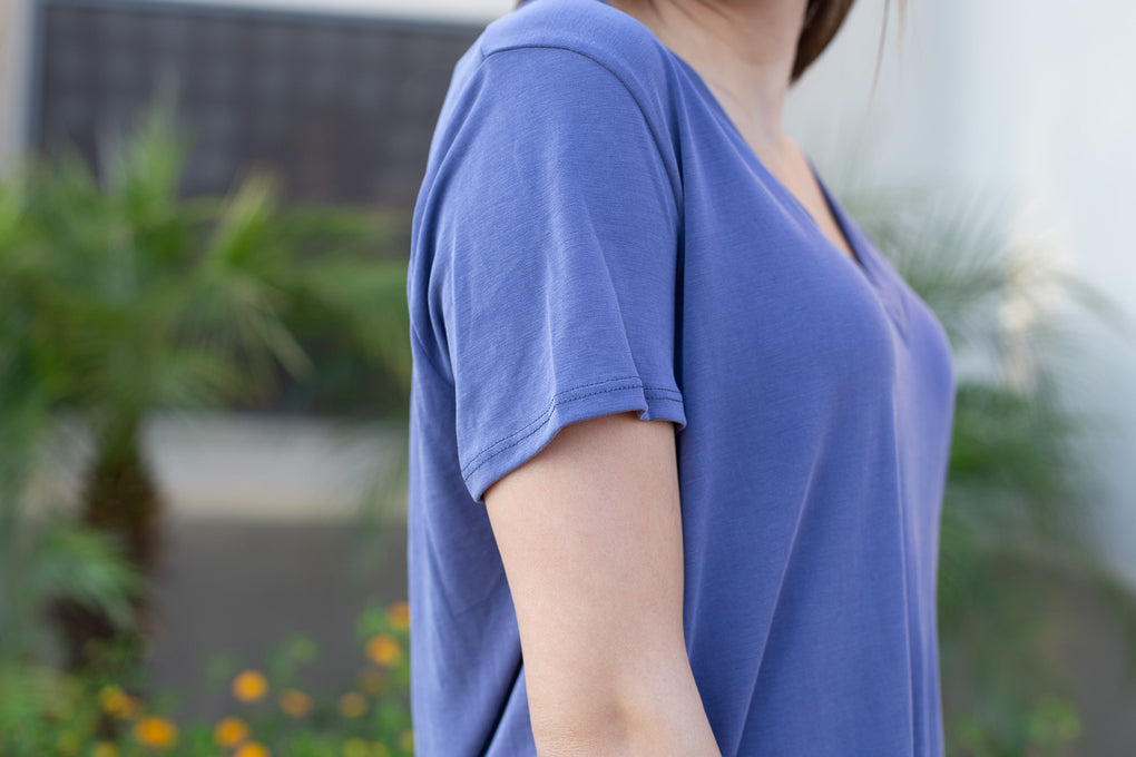 Periwinkle blue T-shirt in silky soft modal fabric with V-neck and side slits