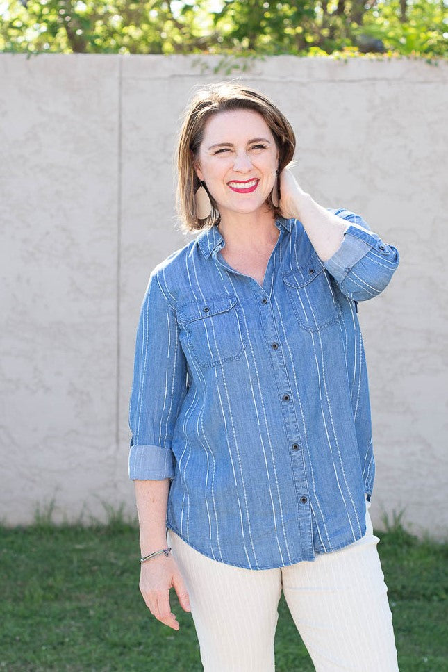 Long sleeved button down blue striped chambray top