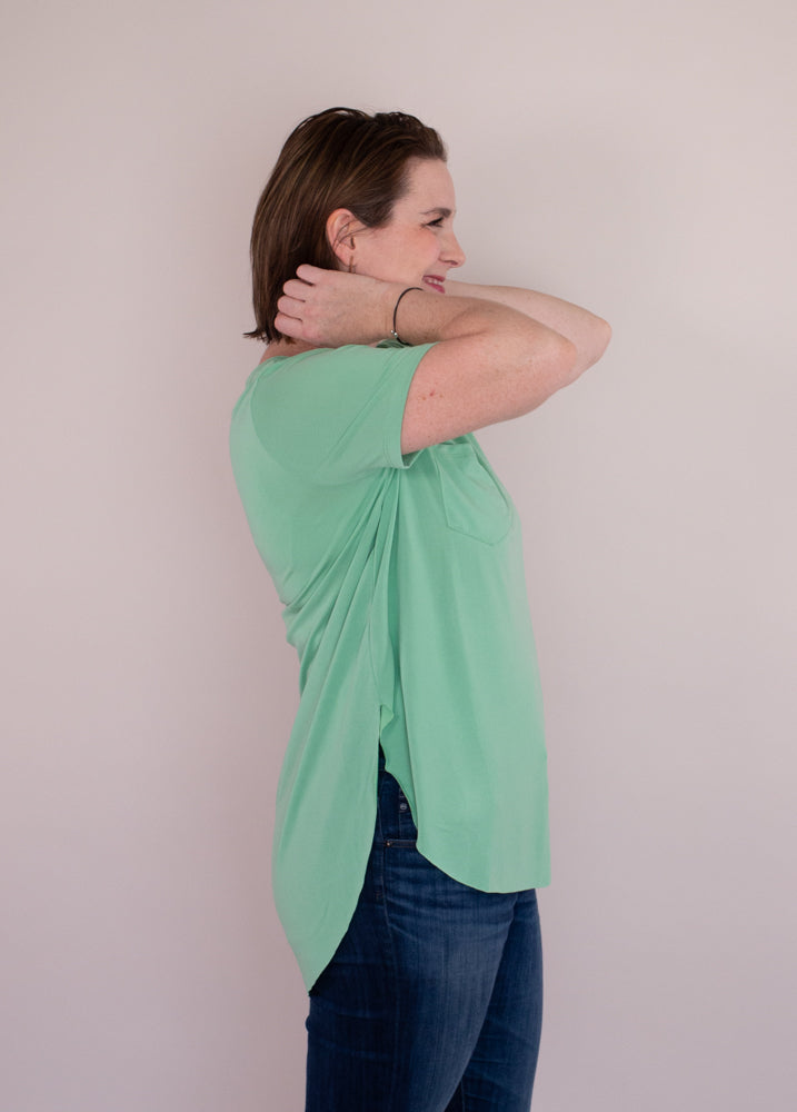 Mint green soft T-shirt with front pocket, side slits and high-low hemline